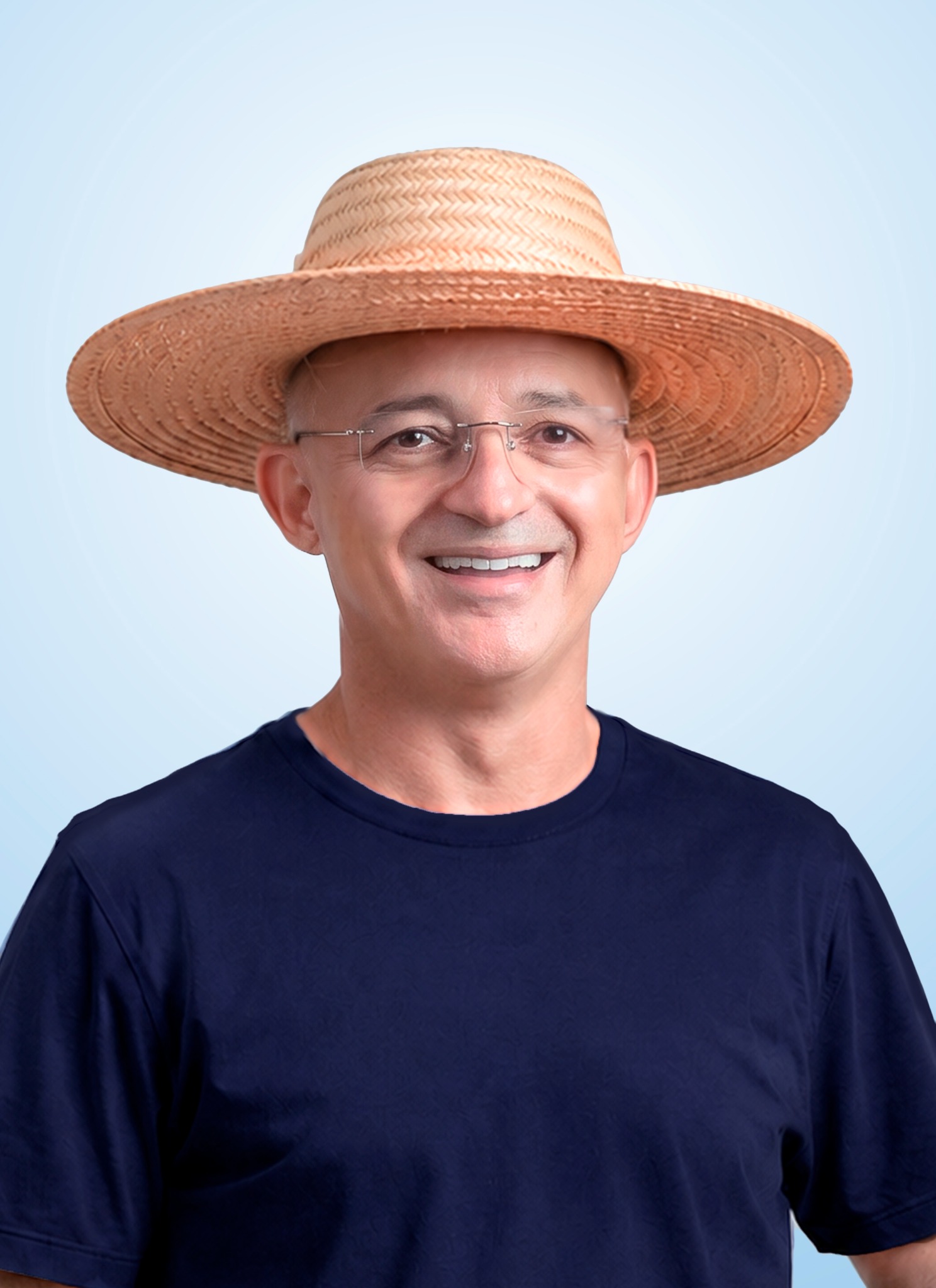 Retrato de Jair Souto com chapéu de palha